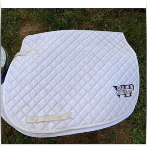 Two white saddle pads. Horse tack. Hunter jumper show jumping eventing
